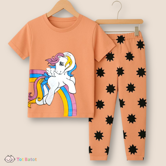 Peach kids pajama set with rainbow unicorn t-shirt and black star print leggings from Tot Batot