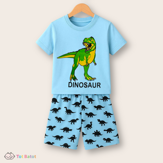Blue boys pajama set with green dinosaur t-shirt and black dinosaur print shorts from Tot Batot